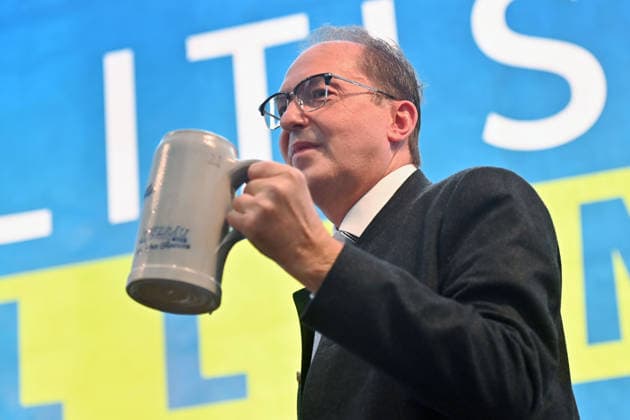 Federal Minister of the Interior Alexander DOBRINDT drinks a Mass of beer from a Masskrug at the Politischer Gillamoos on September 7, 2026, in Abensberg,