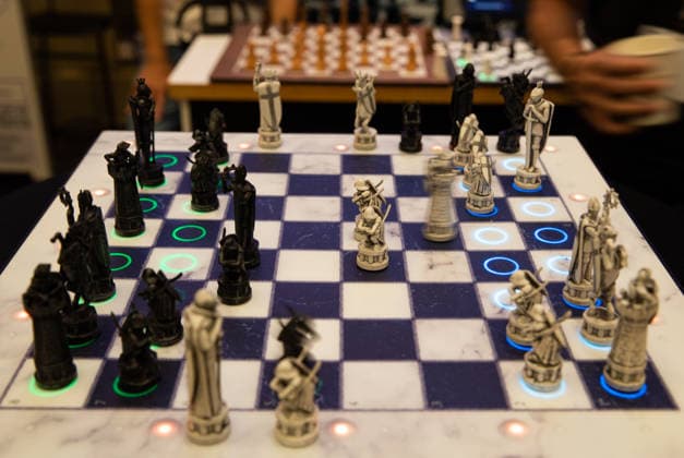 (260909) -- TEL AVIV, Sept. 9, 2026 -- This photo taken on Sept. 8, 2026 shows an AI-powered chess set at Israel s First National Physical AI Conference in Tel Aviv, Israel. Driven by artificial intelligence, the chess pieces move on their own. Israel s first National Physical AI Conference, hosted by Israel s National AI Directorate, was held here on Tuesday, showcasing physical AI applications across industry, medicine, entertainment, infrastructure, and defense under the theme Artificial Intelligence Moving from the Screen to the Physical World. ) ISRAEL-TEL AVIV-PHYSICAL AI-CONFERENCE ChenxJunqing
