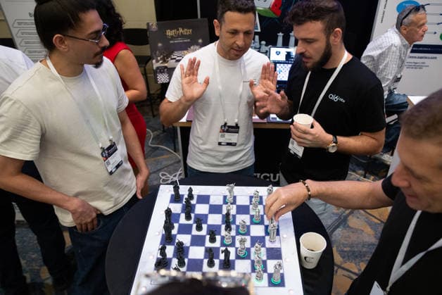 (260909) -- TEL AVIV, Sept. 9, 2026 -- This photo taken on Sept. 8, 2026 shows an AI-powered chess set at Israel s First National Physical AI Conference in Tel Aviv, Israel. Driven by artificial intelligence, the chess pieces move on their own. Israel s first National Physical AI Conference, hosted by Israel s National AI Directorate, was held here on Tuesday, showcasing physical AI applications across industry, medicine, entertainment, infrastructure, and defense under the theme Artificial Intelligence Moving from the Screen to the Physical World. ) ISRAEL-TEL AVIV-PHYSICAL AI-CONFERENCE ChenxJunqing