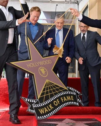 American screenwriter, television producer and director Greg Daniels (C) reacts during an unveiling ceremony honoring him with the 2,856th star on the Hollywood Walk of Fame in Los Angeles on Thursday, September 10, 2026.  LAP2026091006 JIMxRUYMEN