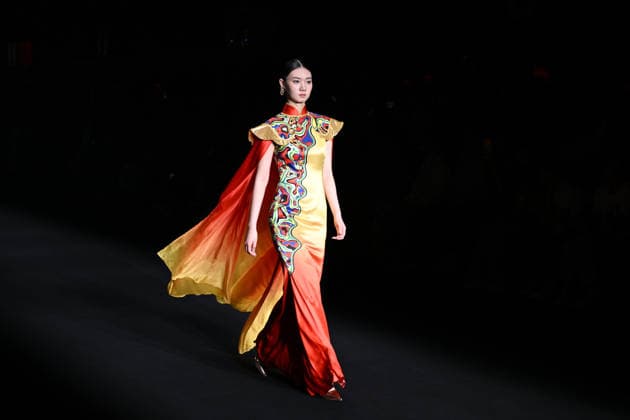 BEIJING, CHINA - SEPTEMBER 10: Models display designs during the Zhu Bingren bronze fashion show at the SS2027 Beijing Fashion Week on September 10, 2026 in Beijing, China. The collection features fused copper art and a unique color system created by designer Zhu Bingren.  Copyright: xChinaxNewsxServicex 111665694813