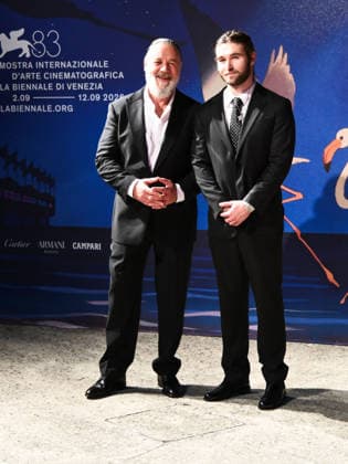 IPA88408913 - Venice International Film Festival 2026 - Night 10 - Red carpet for the film WHAT LOVE BUILDS. Pictured: Russell Crowe, Tennyson Spencer Crowe  Copyright: xAlbertoxTerenghix xPoolxPhotoxEventsx08x IPA88408913