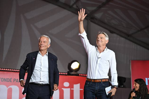 Fete de Humanite near Paris FA French president of French Communist political party Fabien Roussel cheers attendees next to President of MEDEF Patrick Martin after a debate as part of the annual Fete de l Humanite festival organised by the Communist newspaper L Humanite, in Le Plessis-Pate, south of Paris, on September 11, 2026. Photo by Firas Abdullah ABACAPRESS.COM Paris Ile-de-France France  Copyright: xAbdullahxFiras ABACAx