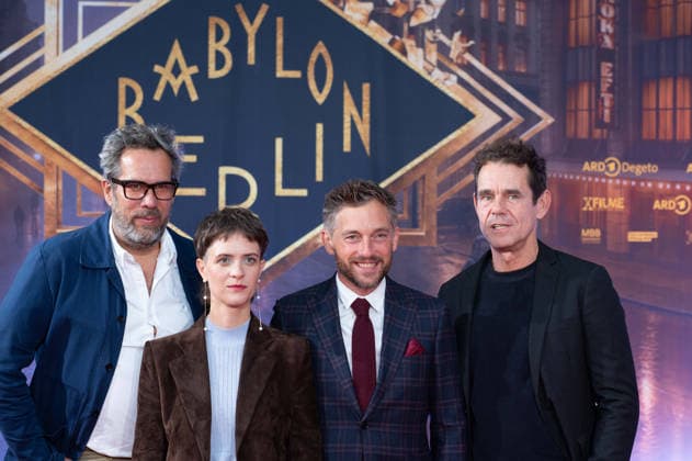 From left: Achim von BORRIES, director; Liv Lisa FRIES, actress; Volker BRUCH, actor; Tom TYKWER, director; Red Carpet, Red Carpet Show, Arrival, Premiere of the final season of Babylon Berlin on September 11, 2026, at the Naturstrom Open-Air Cinema in Rheinau Harbor in Cologne,