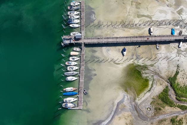 Weather Feature: On a sunny late-summer day at Lake Constance, some boats are stranded on dry land due to the low water level. At the same time, Lake Constance shows its picturesque side—the water shimmers a greenish-blue in the bright sunshine, while the shoreline landscape is visible under an almost cloudless sky. Photo taken Copyright: x xonw-imagesx