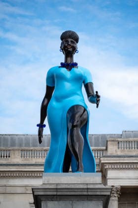 September 12, 2026, London, United Kingdom: Sculpture Lady in Blue with the National Gallery in the background in Trafalgar Square, London. Lady in Blue, a bronze sculpture by New York-based artist Tschabalala Self, stands on the Fourth Plinth in Trafalgar Square, London. Unveiled on 10 September, the work pays homage to a young metropolitan woman of colour and was created as a contemporary everywoman representing the diversity of London today. The sculpture explores themes of representation, recognition and equity, presenting an everyday woman walking forward into a shared future rather than a traditional historical figure or monument. The bronze sculpture is patinated in Lapis Lazuli blue, a pigment with a long history across North - ZUMAs197 20260912_aaa_s197_271 Copyright: xAndreaxDomeniconix