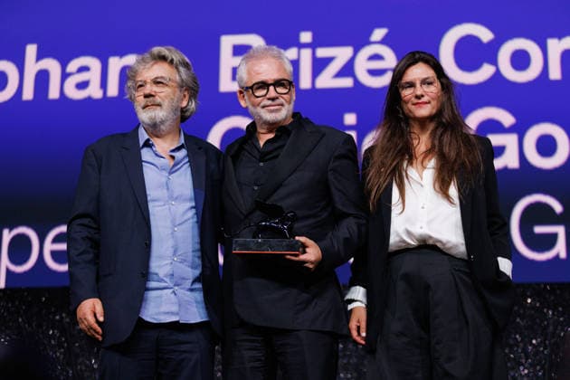 Closing Ceremony - The 83rd Venice International Film Festival VENICE, ITALY - SEPTEMBER 12: (L-R) Olivier Gorce, Stéphane Brizé and Coralie Amedeo receive the Best Screenplay Award for the Un Bon Petit Soldat during the 2026 Closing Ceremony for the 83rd Venice International Film Festival at Sala Grande on September 12, 2026 in Venice, Italy. Primo Barol Anadolu Venice Italy. Editorial use only. Please get in touch for any other usage.  Copyright: x2026xAnadoluxPrimoxBarolx