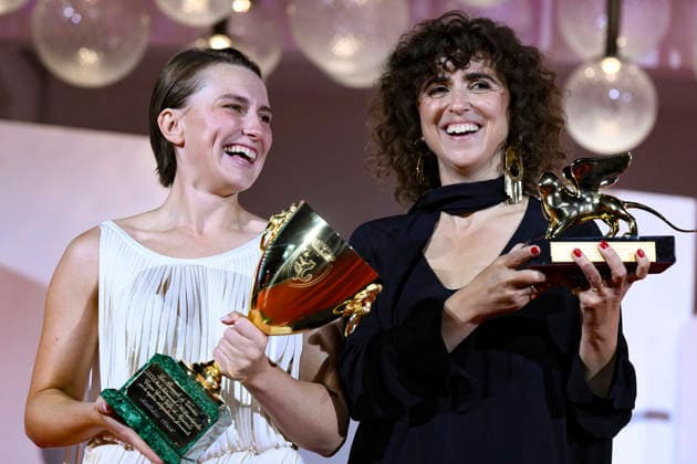 September 12, 2026, Venice, ITALY: Danish director May el-Toukhy holds the Golden Lion award (R) and Danish actor Mathilde Arcel holds the Volpi Cup (Coppa Volpi) Award for Best Actress for their movie Kvinde Ukendt (Woman Unknown) during the closing ceremony of the 83rd annual Venice International Film Festival, in Venice, Italy, 12 September 2026. The 83rd edition of the festival runs from 02 to 12 September 2026. ANSA ETTORE FERRARI Venice ITALY  - ZUMAa110 20260912_zaf_a110_042 Copyright: xEttorexFerrarix