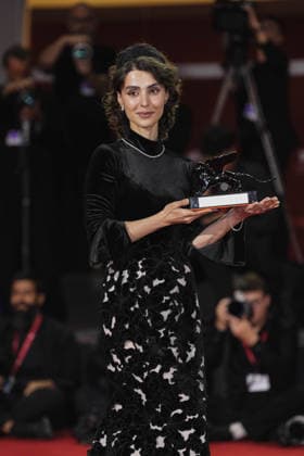 Photo: IPP, Daniele Cifala, Lido di Venezia, September 12, 2026. In the photo, Laleh Marzban poses with the Orizzonti Best Actress Award for *Moragheb: Falling House*. Winners Photocall. The 83rd Venice Film Festival