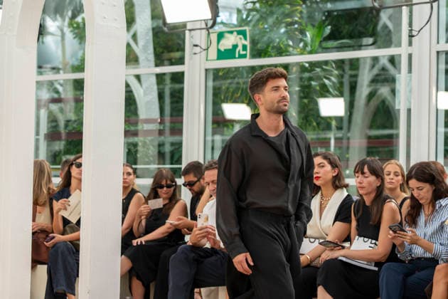 Singer Pablo Alboran walks the runway wearing a creation by Adolfo Dominguez during the presentation of the Croma collection for spring-summer 2027, part of Mercedes-Benz Fashion Week Madrid. The Malaga-born artist, who made an unexpected public reappearance after several weeks away from the stage due to pneumonia, became one of the highlights of the opening day by making a surprise appearance as a model in the Galician label s show. September 14,2026. (202609141013)
