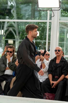 Singer Pablo Alboran walks the runway wearing a creation by Adolfo Dominguez during the presentation of the Croma collection for spring-summer 2027, part of Mercedes-Benz Fashion Week Madrid. The Malaga-born artist, who made an unexpected public reappearance after several weeks away from the stage due to pneumonia, became one of the highlights of the opening day by making a surprise appearance as a model in the Galician label s show. September 14,2026. (202609141016)