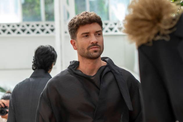 Singer Pablo Alboran walks the runway wearing a creation by Adolfo Dominguez during the presentation of the Croma collection for spring-summer 2027, part of Mercedes-Benz Fashion Week Madrid. The Malaga-born artist, who made an unexpected public reappearance after several weeks away from the stage due to pneumonia, became one of the highlights of the opening day by making a surprise appearance as a model in the Galician label s show. September 14,2026. (202609141073)