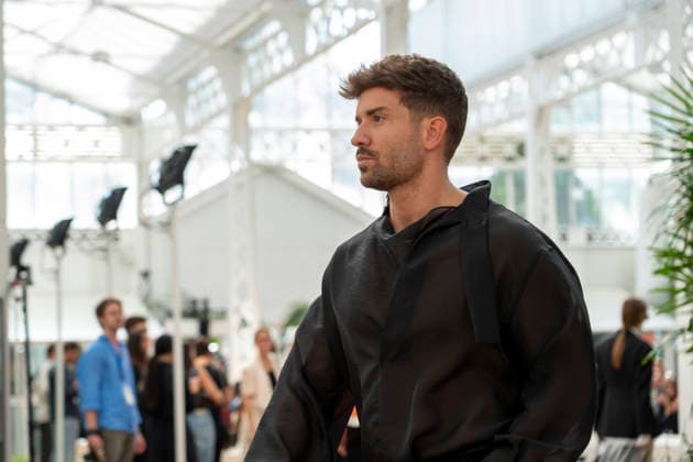 Singer Pablo Alboran walks the runway wearing a creation by Adolfo Dominguez during the presentation of the Croma collection for spring-summer 2027, part of Mercedes-Benz Fashion Week Madrid. The Malaga-born artist, who made an unexpected public reappearance after several weeks away from the stage due to pneumonia, became one of the highlights of the opening day by making a surprise appearance as a model in the Galician label s show. September 14,2026. (202609141078)