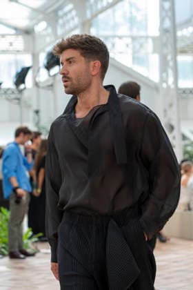 Singer Pablo Alboran walks the runway wearing a creation by Adolfo Dominguez during the presentation of the Croma collection for spring-summer 2027, part of Mercedes-Benz Fashion Week Madrid. The Malaga-born artist, who made an unexpected public reappearance after several weeks away from the stage due to pneumonia, became one of the highlights of the opening day by making a surprise appearance as a model in the Galician label s show. September 14,2026. (202609141002)