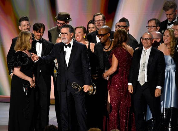 Cast and crew including Ariel Dumas, Opus Moreschi, Lauren Marcello, Sara Vilkomerson, Gabriel W Gronli, Stephen Colbert, Paul Dinello, Bjoern Stejskal, Tanya Michnevich Bracco, Matt Lappin, Michael R Brumm and Aaron Cohen accept the Outstanding Variety Series Award for The Late Show with Stephen Colbert on stage during the 78th annual Primetime Emmy Awards at the Peacock Theater in Los Angeles on Monday, September 14, 2026. LAP20260914124 JIMxRUYMEN
