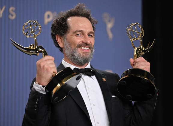 Matthew Rhys holds the Emmy for Outstanding Lead Actor in a Comedy Series Award for Widow s Bay and Outstanding Lead Actor in a Limited or Anthology Series or Movie Award for The Beast in Me, backstage during the 78th annual Primetime Emmy Awards at the Peacock Theater in Los Angeles on Monday, September 14, 2026.  LAP20260914206 CHRISxCHEW