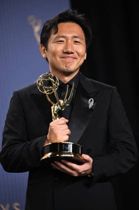 Hiro Murai holds the Emmy for Outstanding Directing for a Comedy Series Award for Widow s Bay, backstage during the 78th annual Primetime Emmy Awards at the Peacock Theater in Los Angeles on Monday, September 14, 2026.  LAP20260914209 CHRISxCHEW