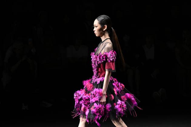 BEIJING, CHINA - SEPTEMBER 14: Models display fashion designs by Daniel IJ Uys and Claudine Uys during the SS2027 Beijing Fashion Week on September 14, 2026 in Beijing, China. The collection, themed Nocturnal Monarch Butterfly, draws inspiration from butterflies dancing in a garden after nightfall.  Copyright: xChinaxNewsxServicex 111666773953