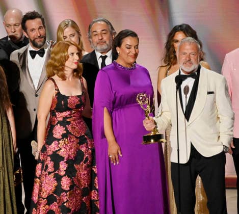 Noah Wyle (L) reacts as Gerran Howell accepts the Outstanding Drama Series Award for The Pitt on stage during the 78th annual Primetime Emmy Awards at the Peacock Theater in Los Angeles on Monday, September 14, 2026.  LAP20260914909 JIMxRUYMEN