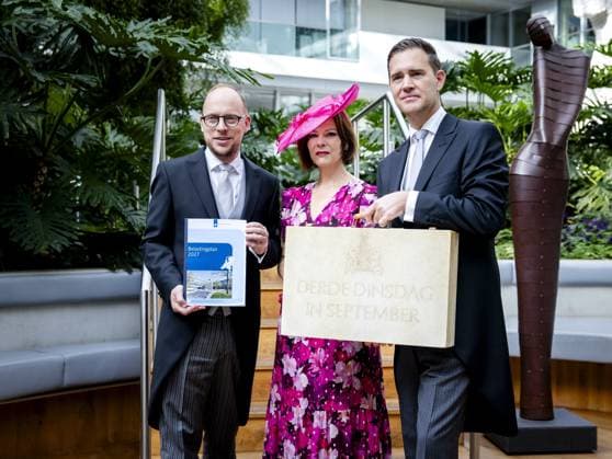 THE HAGUE - Eelco Eerenberg, State Secretary for Finance, Sandra Palmen-Schlangen, State Secretary for Allowance Recovery, and Eelco Heinen, Minister of Finance, pose with the briefcase at the Ministry of Finance during Prinsjesdag. On the third Tuesday of September, the new working year of the Senate and the House of Representatives is opened. REMKO DE WAAL ANP netherlands out - belgium out  Copyright: xx x568693674x originalFilename: 568693674.jpg