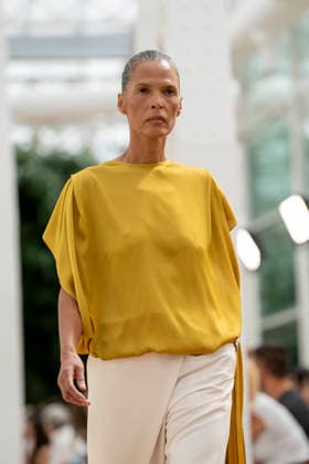 Models present creations from Simorra s FOLD IN collection for spring-summer 2027 during Mercedes-Benz Fashion Week Madrid. The Barcelona-based label, founded in 1978 by Javier Simorra, explores shapes, curves and the fold as a central element in this collection, with garments that adapt to the body and celebrate a beauty that resists rigidity. September 14,2026. (202609141586)