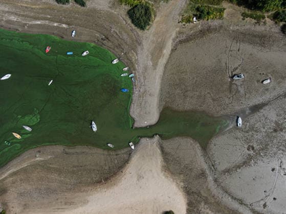 Poland s Zywiec Lake reservoir with low water levels as dry weat ZYWIEC, POLAND- SEPTEMBER 15: An aerial view of recreational boats on dry soil on the Zywiec water reservoir with low water levels due to the ongoing drought in Poland in Zywiec, Poland on September 15, 2026. Zywiec Lake is a reservoir on the Sola River in southern Poland. It was created in 1966, when several villages in the area were flooded following the construction of a dam. The central Eastern European country has been heavily affected by the intense European drought and high temperatures, with several water reservoirs at low water levels and rivers establishing records for low levels. Omar Marques Anadolu Zywiec Poland. Editorial use only. Please get in touch for any o  Copyright: x2026xAnadoluxOmarxMarquesx