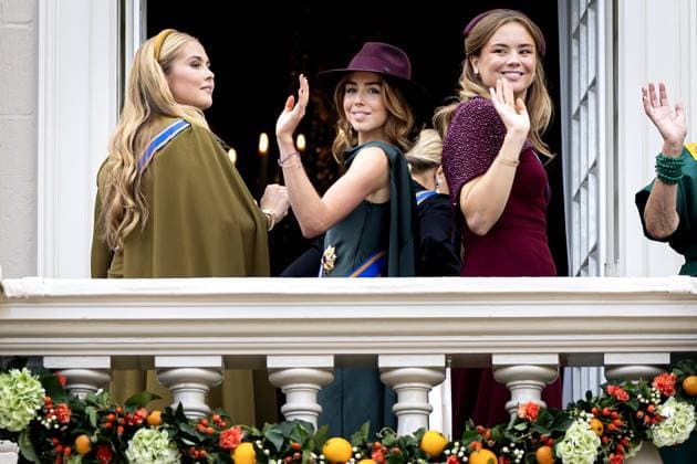 THE HAGUE - Princess Amalia, Princess Alexia, and Princess Ariane wave to onlookers from the balcony of Noordeinde Palace on Prinsjesdag. On the third Tuesday of September, the new working year of the First and Second Chambers is opened. RAMON VAN FLYMEN ANP netherlands out - belgium out  Copyright: xx x568711394x originalFilename: 568711394.jpg