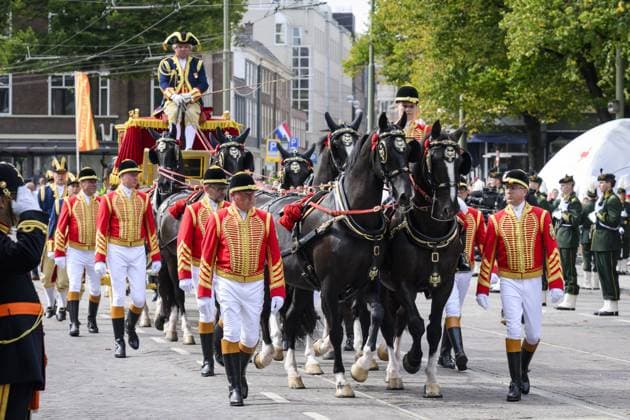 THE HAGUE - King Willem-Alexander, Queen Maxima, and Princess Amalia arrive in the glass coach at the Royal Theatre for the Speech from the Throne on Prinsjesdag. On the third Tuesday of September, the new working year of the First and Second Chambers is opened. PATRICK VAN EMST POOL ANP netherlands out - belgium out  Copyright: xx x568713617x originalFilename: 568713617.jpg