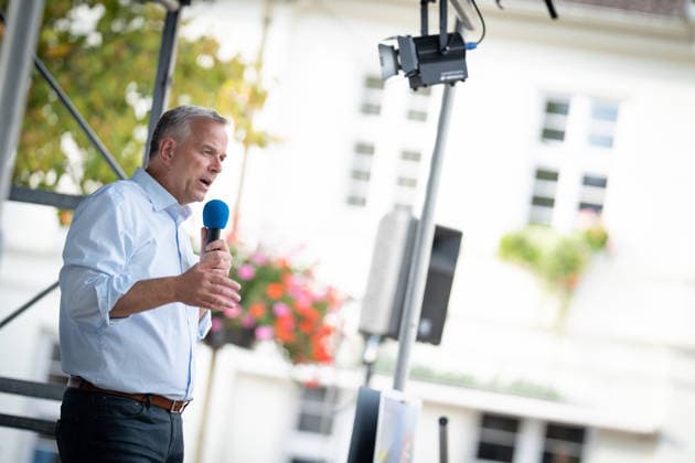 AfD candidate for state premier Leif Eric Holm at the market square in Bad Doberan; AfD campaign event in Bad Doberan for the 2026 state election in Mecklenburg-Western Pomerania, Bad Doberan, Mecklenburg-Western Pomerania, Germany, market square