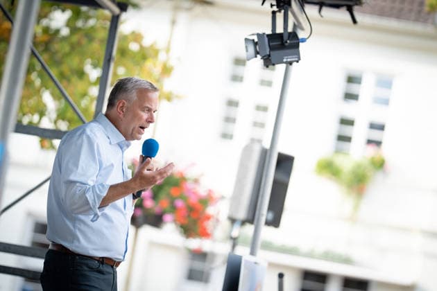 AfD candidate for state premier Leif Eric Holm at the market square in Bad Doberan; AfD campaign event in Bad Doberan for the 2026 state election in Mecklenburg-Western Pomerania, Bad Doberan, Mecklenburg-Western Pomerania, Germany, market square