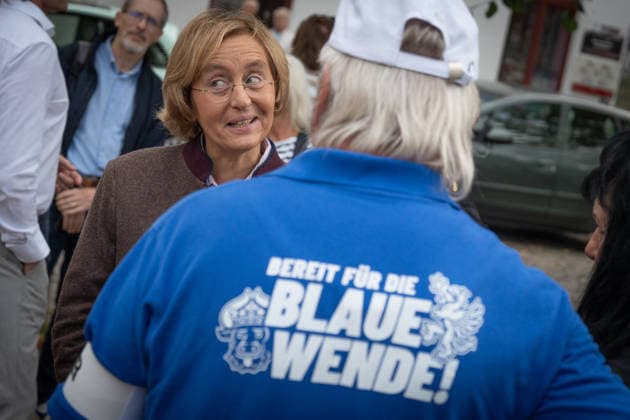 AfD politician Beatrix von Storch talking with residents in the market square in Bad Doberan; AfD campaign event in Bad Doberan for the 2026 state election in Mecklenburg-Western Pomerania; Bad Doberan, Mecklenburg-Western Pomerania, Germany; market square