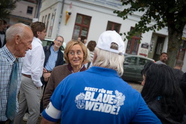 AfD politician Beatrix von Storch talking with residents in the market square in Bad Doberan; AfD campaign event in Bad Doberan for the 2026 state election in Mecklenburg-Western Pomerania; Bad Doberan, Mecklenburg-Western Pomerania, Germany; market square