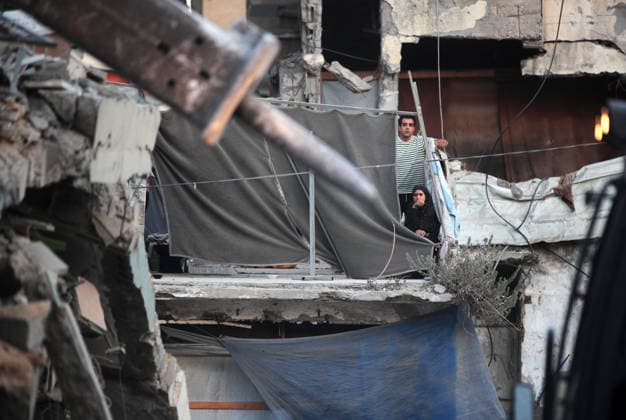 Aftermath of Israeli Airstrike In Gaza Palestinians watch as civil defense workers attempt to rescue people trapped beneath the rubble of a residential building in Gaza City, on September 16, 2026. The building collapsed on Wednesday after being damaged in an earlier Israeli strike during the war. Gaza Palestine  Copyright: xMajdixFathix originalFilename: fathi-notitle260915_np0qx.jpg