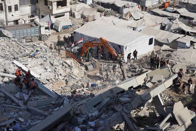 Rescuers search collapsed building for missing in Gaza City Rescuers excavate rubble to retrieve bodies from a collapsed building in the Tal al-Hawa area of Gaza City on September 16, 2026. Gaza s civil defence agency said rescuers were searching for dozens of missing people after the six-storey building, which housed people displaced by the war with Israel, collapsed killing eight people, including children, and fell onto nearby residential structures and tents. Photo by Belal Osama apaimages Gaza Gaza Strip Palestinian Territory 160926_Gaza_BO_00(67) Copyright: xapaimagesxBelalxOsamax xapaimagesx