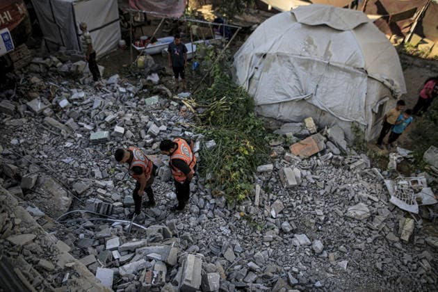 11 Palestinians killed as damaged six-story building collapses onto displaced tents in Gaza GAZA CITY, GAZA, PALESTINE - SEPTEMBER 16: Search and rescue teams on duty around the rubble after a damaged six-story building collapsed in the Al-Sinaa area of southwestern Gaza City, Gaza, Palestine on September 16, 2026. The building, previously damaged during Israeli airstrikes, collapsed onto neighboring tents housing displaced Palestinians, leaving at least 11 people dead, including five children, and injuring 14 others as civil defense and municipal teams continue search-and-rescue operations. Saeed M. M. T. Jaras Anadolu Gaza City Gaza. Editorial use only. Please get in touch for any other usage.  Copyright: x2026xAnadoluxSaeedxM.xM.xT.xJarasx