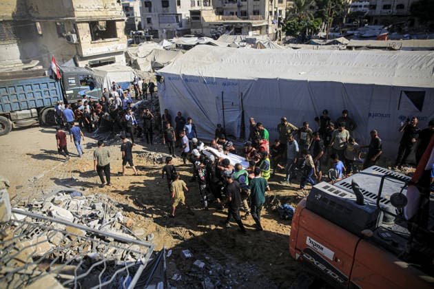 11 Palestinians killed as damaged six-story building collapses onto displaced tents in Gaza GAZA CITY, GAZA, PALESTINE - SEPTEMBER 16: Search and rescue teams on duty around the rubble after a damaged six-story building collapsed in the Al-Sinaa area of southwestern Gaza City, Gaza, Palestine on September 16, 2026. The building, previously damaged during Israeli airstrikes, collapsed onto neighboring tents housing displaced Palestinians, leaving at least 11 people dead, including five children, and injuring 14 others as civil defense and municipal teams continue search-and-rescue operations. Saeed M. M. T. Jaras Anadolu Gaza City Gaza. Editorial use only. Please get in touch for any other usage.  Copyright: x2026xAnadoluxSaeedxM.xM.xT.xJarasx