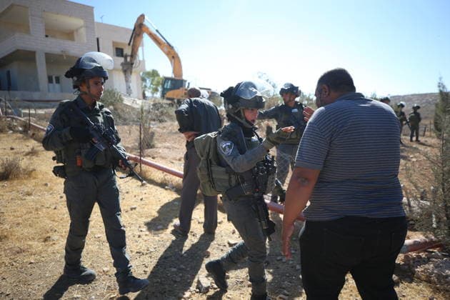 Israeli army demolishes two-story Palestinian house in West Bank HEBRON, WEST BANK, PALESTINE - SEPTEMBER 16: Palestinians protest the demolition as Israeli forces demolish of a two-story Palestinian house in the Hillet al-Hams area of Yatta town in Hebron, West Bank, Palestine on September 16, 2026. Wisam Hashlamoun Anadolu Hebron West Bank. Editorial use only. Please get in touch for any other usage.  Copyright: x2026xAnadoluxWisamxHashlamounx
