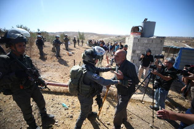 Israeli army demolishes two-story Palestinian house in West Bank HEBRON, WEST BANK, PALESTINE - SEPTEMBER 16: Palestinians protest the demolition as Israeli forces demolish of a two-story Palestinian house in the Hillet al-Hams area of Yatta town in Hebron, West Bank, Palestine on September 16, 2026. Wisam Hashlamoun Anadolu Hebron West Bank. Editorial use only. Please get in touch for any other usage.  Copyright: x2026xAnadoluxWisamxHashlamounx