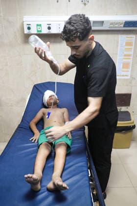 Israeli attacks continue on Gaza DEIR AL-BALAH, GAZA, PALESTINE - SEPTEMBER 16 : (EDITORS NOTE: Image depicts graphic content) An injured Palestinian child receives medical treatment at Al-Awda Hospital after an Israeli attack targeted a group of Palestinians waiting to collect water at the Bureij Refugee Camp in the central Gaza Strip, in Deir al-Balah, Gaza, Palestine on September 16, 2026. Moiz Salhi Anadolu Deir Al Balah Gaza. Editorial use only. Please get in touch for any other usage.  Copyright: x2026xAnadoluxMoizxSalhix