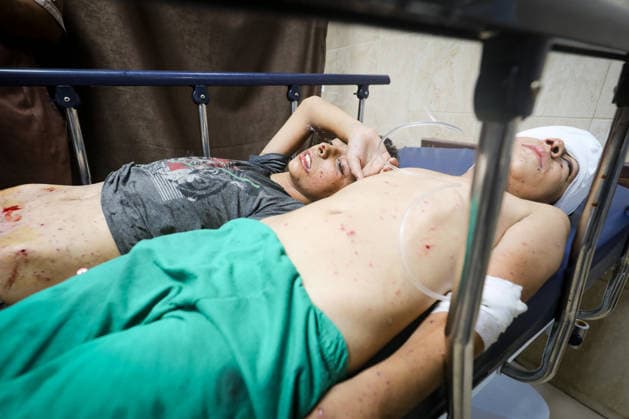 Israeli attacks continue on Gaza DEIR AL-BALAH, GAZA, PALESTINE - SEPTEMBER 16 : (EDITORS NOTE: Image depicts graphic content) An injured Palestinian child receives medical treatment at Al-Awda Hospital after an Israeli attack targeted a group of Palestinians waiting to collect water at the Bureij Refugee Camp in the central Gaza Strip, in Deir al-Balah, Gaza, Palestine on September 16, 2026. Moiz Salhi Anadolu Deir Al Balah Gaza. Editorial use only. Please get in touch for any other usage.  Copyright: x2026xAnadoluxMoizxSalhix