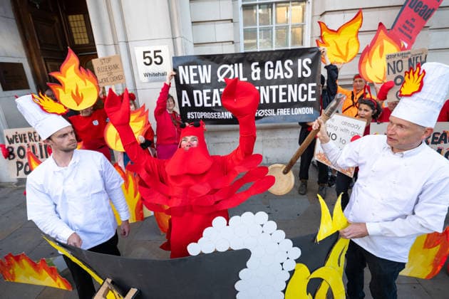 September 16, 2026, London, United Kingdom: Activists from Fossil Free London stage a protest outside the Department for Energy Security and Net Zero (DESNZ) in Whitehall. The protest feature a giant lobster inside a cooking pot surrounded by demonstrators dressed as ˜Shell chefs™. The lobster represents a planet being pushed towards dangerous levels of warming, while the ˜Shell chefs™ represent the fossil fuel industry continuing to pursue new oil and gas projects. The action comes as the Government faces pressure over new North Sea oil and gas developments, including the Rosebank and Jackdaw fields. London United Kingdom - ZUMAs197 20260916_aaa_s197_021 Copyright: xAndreaxDomeniconix