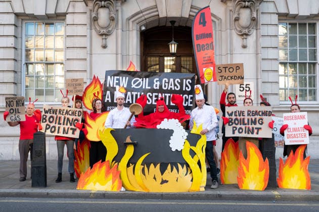 September 16, 2026, London, United Kingdom: Activists from Fossil Free London stage a protest outside the Department for Energy Security and Net Zero (DESNZ) in Whitehall. The protest feature a giant lobster inside a cooking pot surrounded by demonstrators dressed as ˜Shell chefs™. The lobster represents a planet being pushed towards dangerous levels of warming, while the ˜Shell chefs™ represent the fossil fuel industry continuing to pursue new oil and gas projects. The action comes as the Government faces pressure over new North Sea oil and gas developments, including the Rosebank and Jackdaw fields. London United Kingdom - ZUMAs197 20260916_aaa_s197_022 Copyright: xAndreaxDomeniconix