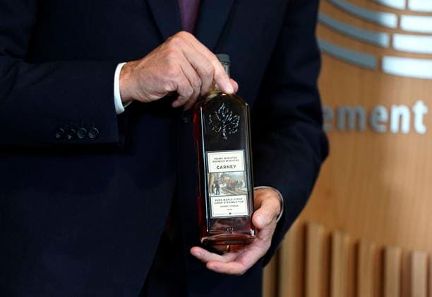 September 16, 2026, Strasbourg, France: Prime Minister Mark Carney holds up a bottle of maple syrup labelled with his name and title, as he participates in a gift exchange with President of the European Parliament Roberta Metsola during a bilateral meeting at the European Parliament in Strasbourg, France, on Wednesday, Sept. 16, 2026. Strasbourg France  - ZUMAc35_ 20260916_zaf_c35_048 Copyright: xJustinxTangx