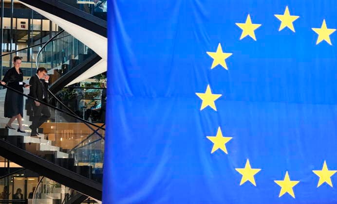 September 16, 2026, Strasbourg, France: Ambassador-designate to the European Union Jonathan Wilkinson, second from left, passes a large EU flag as he walks to take questions from journalists at the European Parliament in Strasbourg, France, on Wednesday, Sept. 16, 2026. Strasbourg France  - ZUMAc35_ 20260916_zaf_c35_053 Copyright: xJustinxTangx