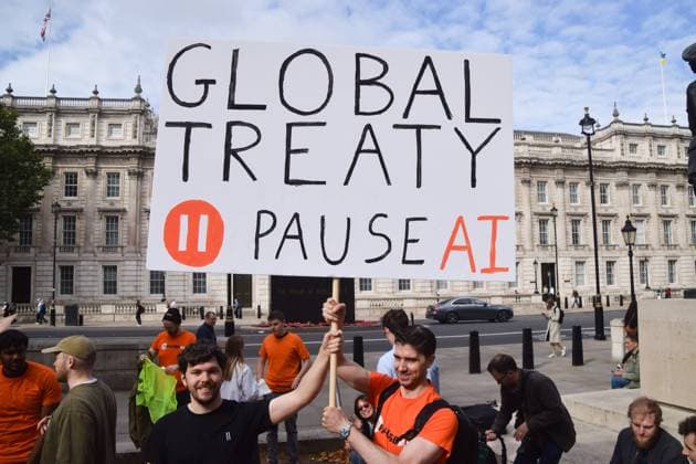 September 16, 2026, London, United Kingdom: Protesters hold a banner calling for a global treaty on AI during the demonstration by the group Pause AI outside Downing Street..The protesters are urging the government to pause the development of artificial intelligence amid warnings that it could lead to human extinction. London United Kingdom - ZUMAs197 20260916_aaa_s197_043 Copyright: xVukxValcicx