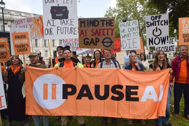 September 16, 2026, London, United Kingdom: Protesters hold placards and a banner during the demonstration by the group Pause AI outside Downing Street..The protesters are urging the government to pause the development of artificial intelligence amid warnings that it could lead to human extinction. London United Kingdom - ZUMAs197 20260916_aaa_s197_048 Copyright: xVukxValcicx