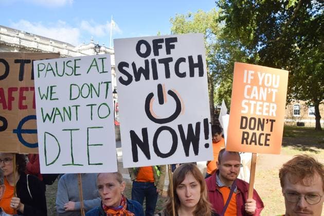 September 16, 2026, London, United Kingdom: A protester holds a placard calling for an off switch during the demonstration by the group Pause AI outside Downing Street..The protesters are urging the government to pause the development of artificial intelligence amid warnings that it could lead to human extinction. London United Kingdom - ZUMAs197 20260916_aaa_s197_046 Copyright: xVukxValcicx