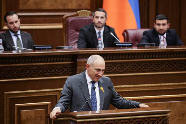 ARMENIA, YEREVAN - SEPTEMBER 16, 2026: Armenia s Prime Minister Nikol Pashinyan (foreground) addresses the Armenian Parliament during the second session of its 9th convocation. Alexander Patrin TASS  97822458
