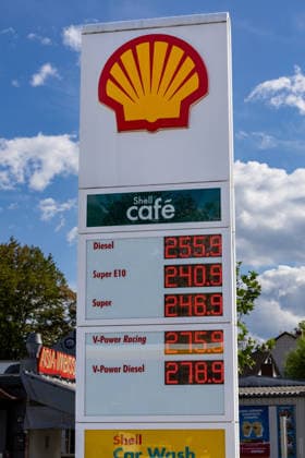 Gas Prices at a Shell Gas Station, September 16, 2026 The Shell logo above a price board displaying high gas prices at a gas station. Diesel costs 2.559 euros per liter, Super E10 costs 2.409 euros, and Super costs 2.469 euros. The gas station is located in the city center