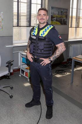 ABB HAFENKANTE Marc Barthel, actor in police uniform, at a photo op marking the premiere of the 20th anniversary season and the 500th episode of the ZDF TV series *Notruf Hafenkante* on the original set of PK 21 at Studio Hamburg on September 16, 2026, in Hamburg
